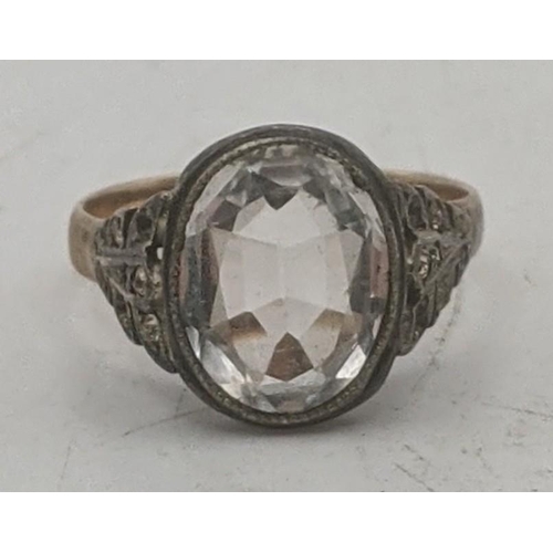 197 - A Victorian oval faceted cut rock crystal, set in silver with a yellow gold shank tested as 9ct, set... 