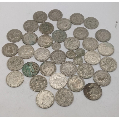 205 - A collection of 1920s/1946 silver British coinage to include sixpences, and half crowns, total weigh... 