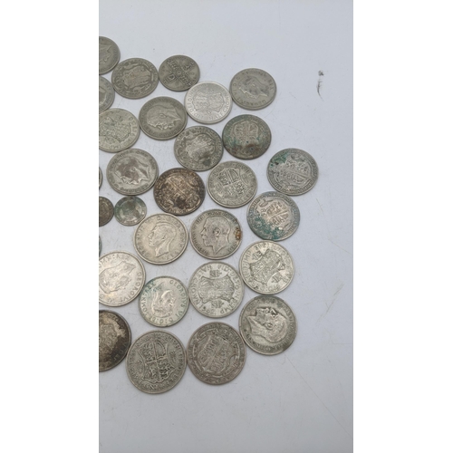 206 - A collection of 1920s/1946 silver British coinage to include half crowns, total weight 507.7g Locati... 