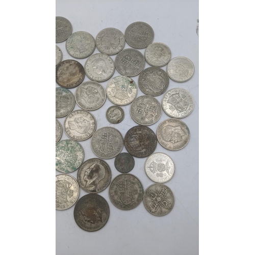 207 - A collection of 1920s/1946 silver British coinage to include florins and others, total weight 509.8g... 