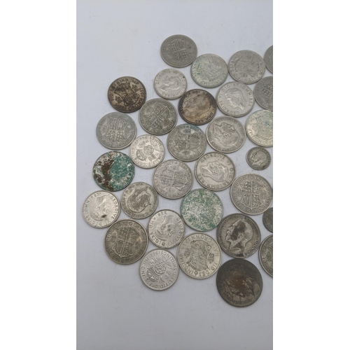 207 - A collection of 1920s/1946 silver British coinage to include florins and others, total weight 509.8g... 