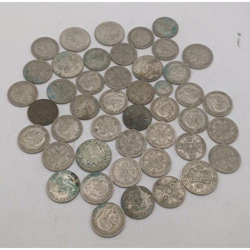 208 - A collection of 1920s/1946 silver British coinage to include half crowns and others, total weight 51... 