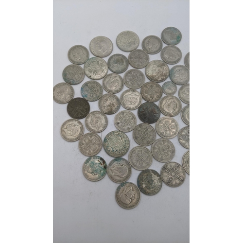 208 - A collection of 1920s/1946 silver British coinage to include half crowns and others, total weight 51... 