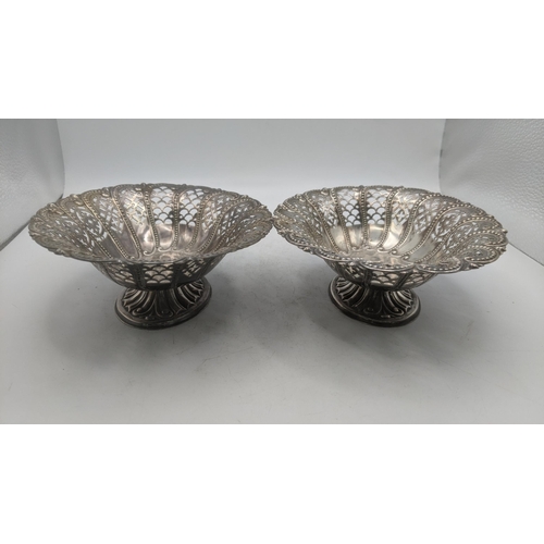 212 - A pair of Atkins Brothers silver pierced pedestal pin dishes of oval form, bearing different dates t... 