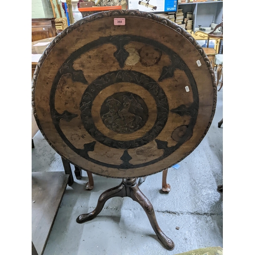 368 - A George III carved mahogany pedestal table with birdcage action, the circular tilt top with carved ... 