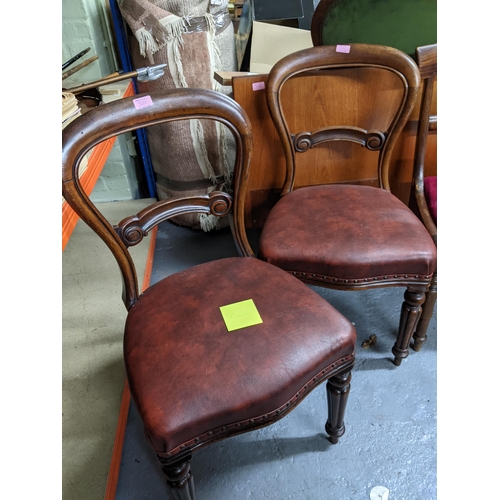 371 - A mixed group of 19th century chairs to include two Victorian balloon back chairs with red leather s... 