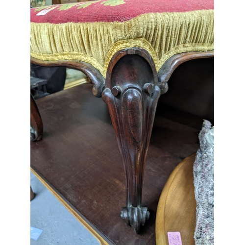 372 - A Victorian rosewood stool with tapestry upholstered top on carved cabriole legs with scrolled end f... 