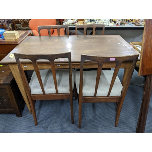 376 - A mid-century retro teak extending dining table on shaped tapering legs 76cm x 129cm x 80cm (unexten... 