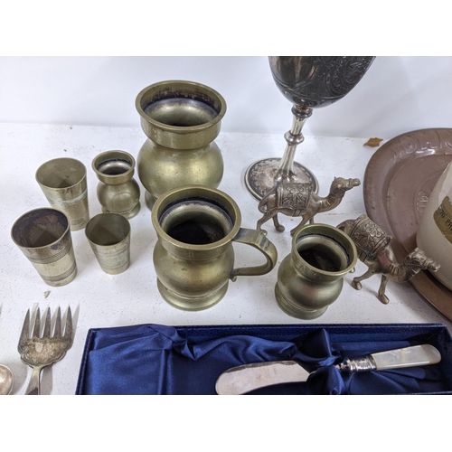 391 - Mixed metalware, silver plate and EPNS to include ceramic, flagons, ceremonial and presentation item... 