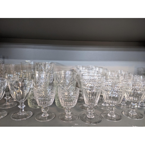 396 - A large collection of cut glass tumblers, wine glasses and other drinking vessels
Location:8.1/8.2 I... 