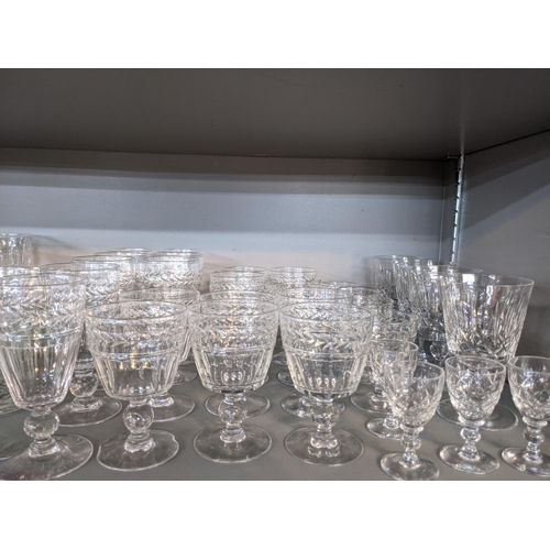 396 - A large collection of cut glass tumblers, wine glasses and other drinking vessels
Location:8.1/8.2 I... 