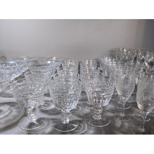 396 - A large collection of cut glass tumblers, wine glasses and other drinking vessels
Location:8.1/8.2 I... 