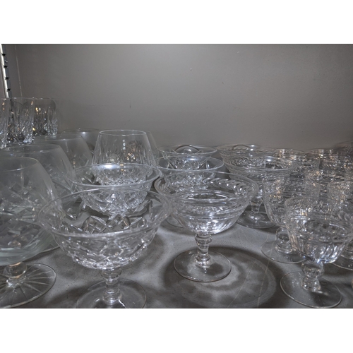 396 - A large collection of cut glass tumblers, wine glasses and other drinking vessels
Location:8.1/8.2 I... 