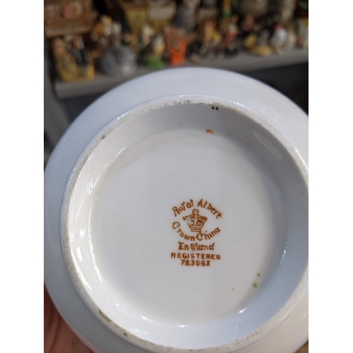 397 - A part Lynns dinner service, white with a gold rim and a Royal Albert Crown china part dinner servic... 