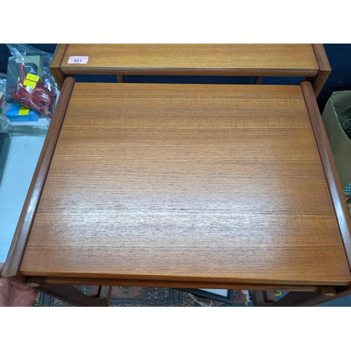 401 - A G-Plan nesting set of teak tables 53.5cm w x 42cm d x 49cm h Location: RWM
If there is no conditio... 