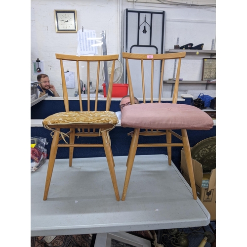 402 - A pair of blonde Ercol spindle back dining chairs Location: RWM
If there is no condition report show... 