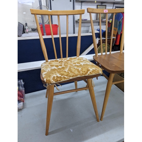 402 - A pair of blonde Ercol spindle back dining chairs Location: RWM
If there is no condition report show... 