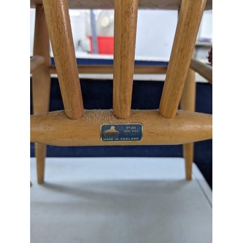 402 - A pair of blonde Ercol spindle back dining chairs Location: RWM
If there is no condition report show... 