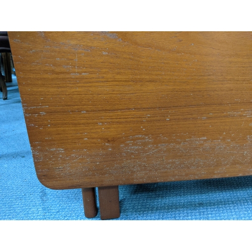 403 - A possibly McIntosh teak drop leaf table 83cm w x 76cm h x 22cm/ 145  Location: LWM
If there is no c... 