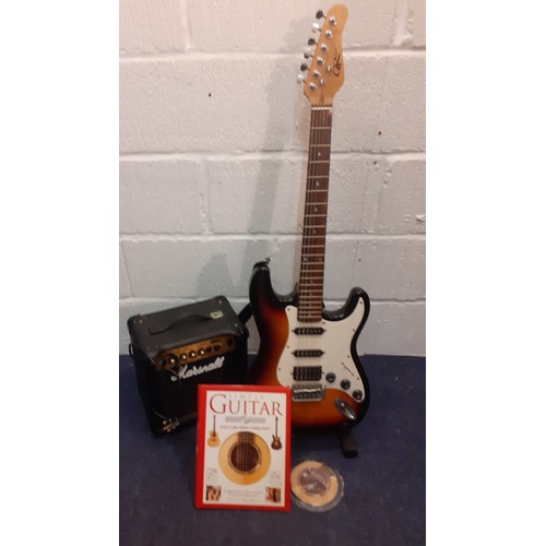 455 - A GR Tomcat electric guitar with folding stand, a Marshall MG10CD Series amp with cable and a guitar... 