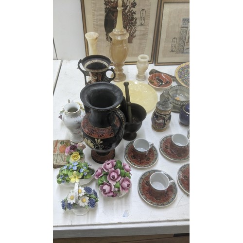 490 - A mixed lot of metalware, mostly silver plate together with a brass table top ink pot, a John Lewis ... 