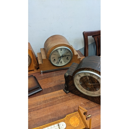 306 - A collection of early to mid 20th century mantle clocks, along with a barometer
Location: RAB If the... 