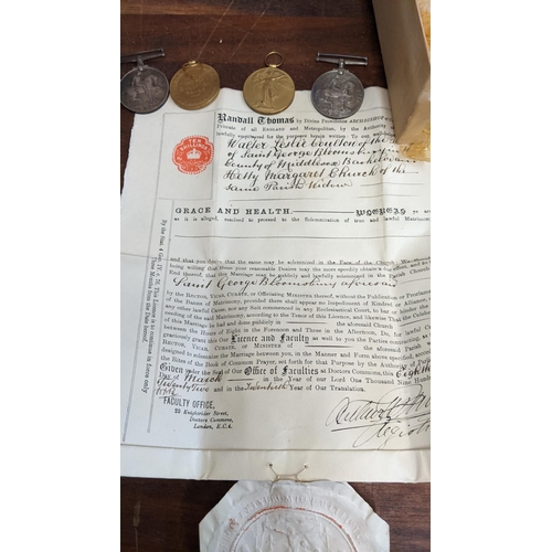 321 - A mixed lot to include four First World War medals, a letter from the Faculty Office signed and date... 