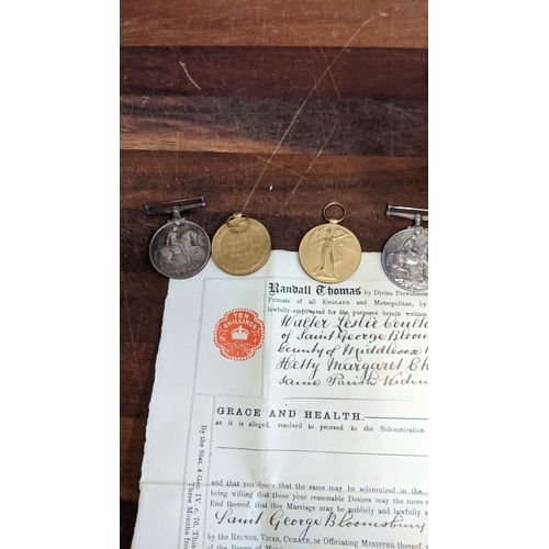 321 - A mixed lot to include four First World War medals, a letter from the Faculty Office signed and date... 