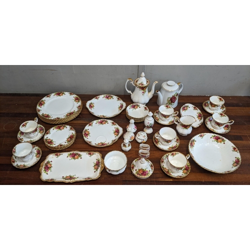 323 - A collection of teaware to include mostly Royal Albert Country Roses pattern items and Royal Crown D... 