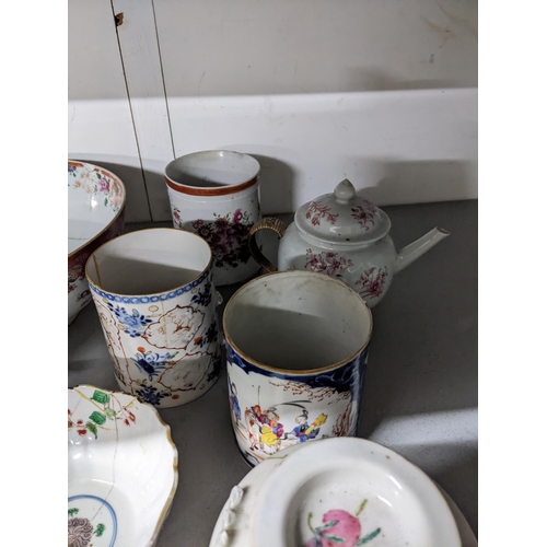 426 - A selection of 18th and 19th century Chinese famille rose porcelain to include teapots, punch bowls,... 