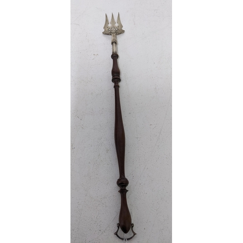 431 - An Edward VII silver and turned wood toasting fork, the handle terminating with a silver hanging loo... 