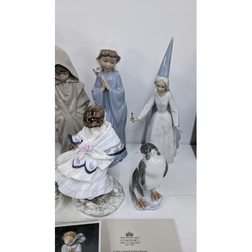 473 - A selection of porcelain figure to include a Lladro gres monk, two Coalport figures and others
Locat... 