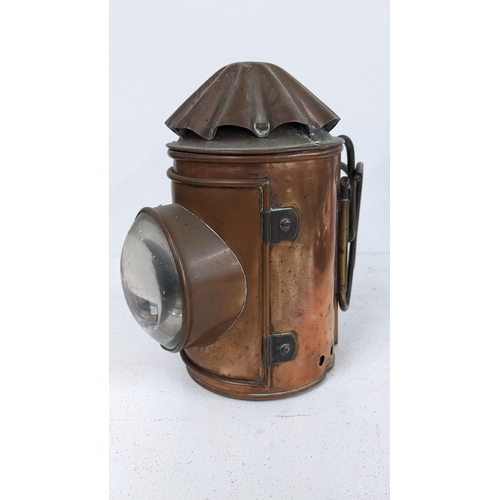 476 - An early 20th century copper bullseye railway lantern, 17cm h
Location:10.1
If there is no report sh... 