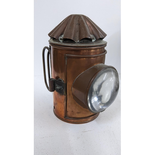 476 - An early 20th century copper bullseye railway lantern, 17cm h
Location:10.1
If there is no report sh... 