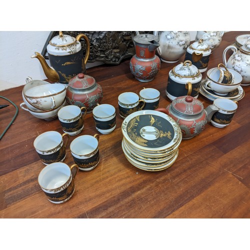 299 - Tw Japanese porcelain tea services and a Chinese three piece Yixing teaset A/F
Location:  4-5 If the... 