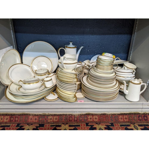 395 - A Hughes-Longpont dinner service, consisting of meat plates, lidded tureens, side plates, saucers an... 