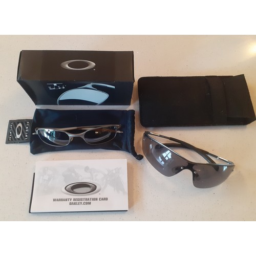 65 - Two pairs of sunglasses comprising Oakley and Bolle. Location:R1:3
If there is no condition report, ... 