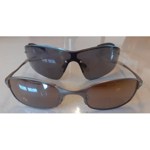 65 - Two pairs of sunglasses comprising Oakley and Bolle. Location:R1:3
If there is no condition report, ... 