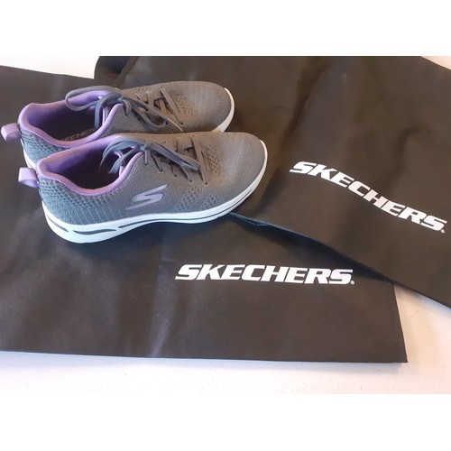 94 - Sketchers-A pair of ladies grey ArchFit Ultra 60 trainers, size UK4, with purple accents together wi... 