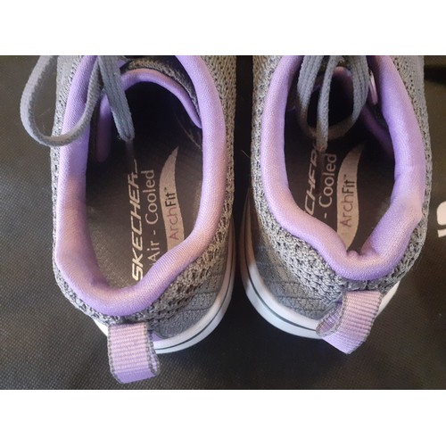 94 - Sketchers-A pair of ladies grey ArchFit Ultra 60 trainers, size UK4, with purple accents together wi... 