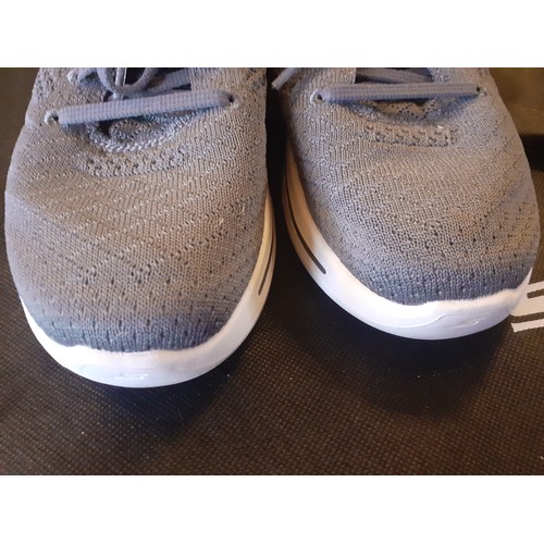 94 - Sketchers-A pair of ladies grey ArchFit Ultra 60 trainers, size UK4, with purple accents together wi... 