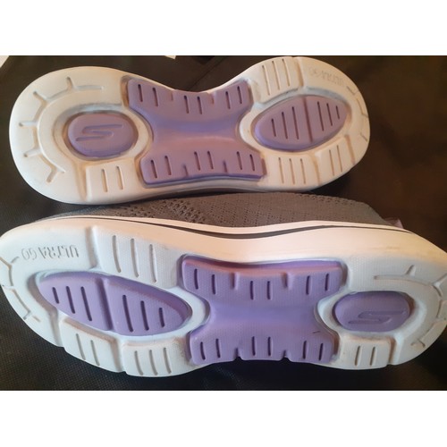 94 - Sketchers-A pair of ladies grey ArchFit Ultra 60 trainers, size UK4, with purple accents together wi... 