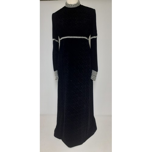 51 - Jean Varon, British Designer- A 1960's black full length plush velvet gown with silver metallic embr... 