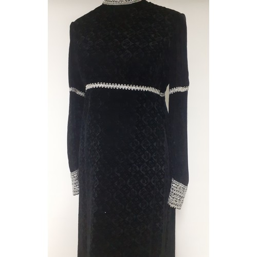 51 - Jean Varon, British Designer- A 1960's black full length plush velvet gown with silver metallic embr... 