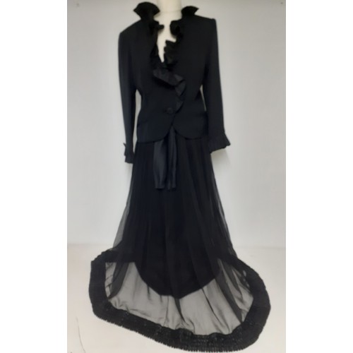 52 - Hartnell, British Designer- A black evening jacket with ruffled collar and cuffs approx 38