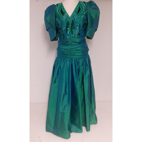 53 - Christina Stambolian, Greek Designer- A 1980's green taffeta silk, made in Paris, a full length gown... 