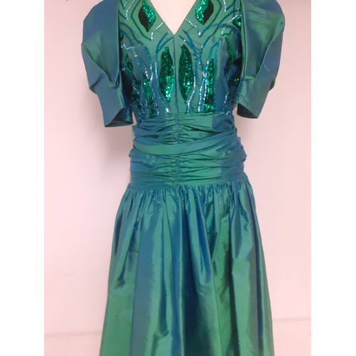 53 - Christina Stambolian, Greek Designer- A 1980's green taffeta silk, made in Paris, a full length gown... 