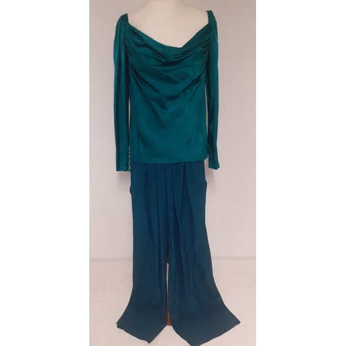 54 - Yves Saint Laurent, French designer- A Saint Laurent Rive Gauche green/teal silk blouse having zippe... 