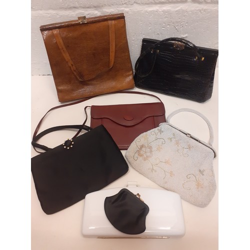 69 - A group of 6 vintage bags to include a mid 20th Century brown snakeskin handbag 24cm x 22cm, a black... 