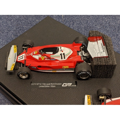 100 - Two model F1 cars by GP Replicas, boxed to include a Ferrari 312T 1975, N12 Niki Lauda - Limited Edi... 